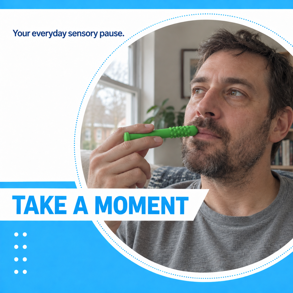 Man holding a green silicone sensory chew stick near his lips during a quiet break